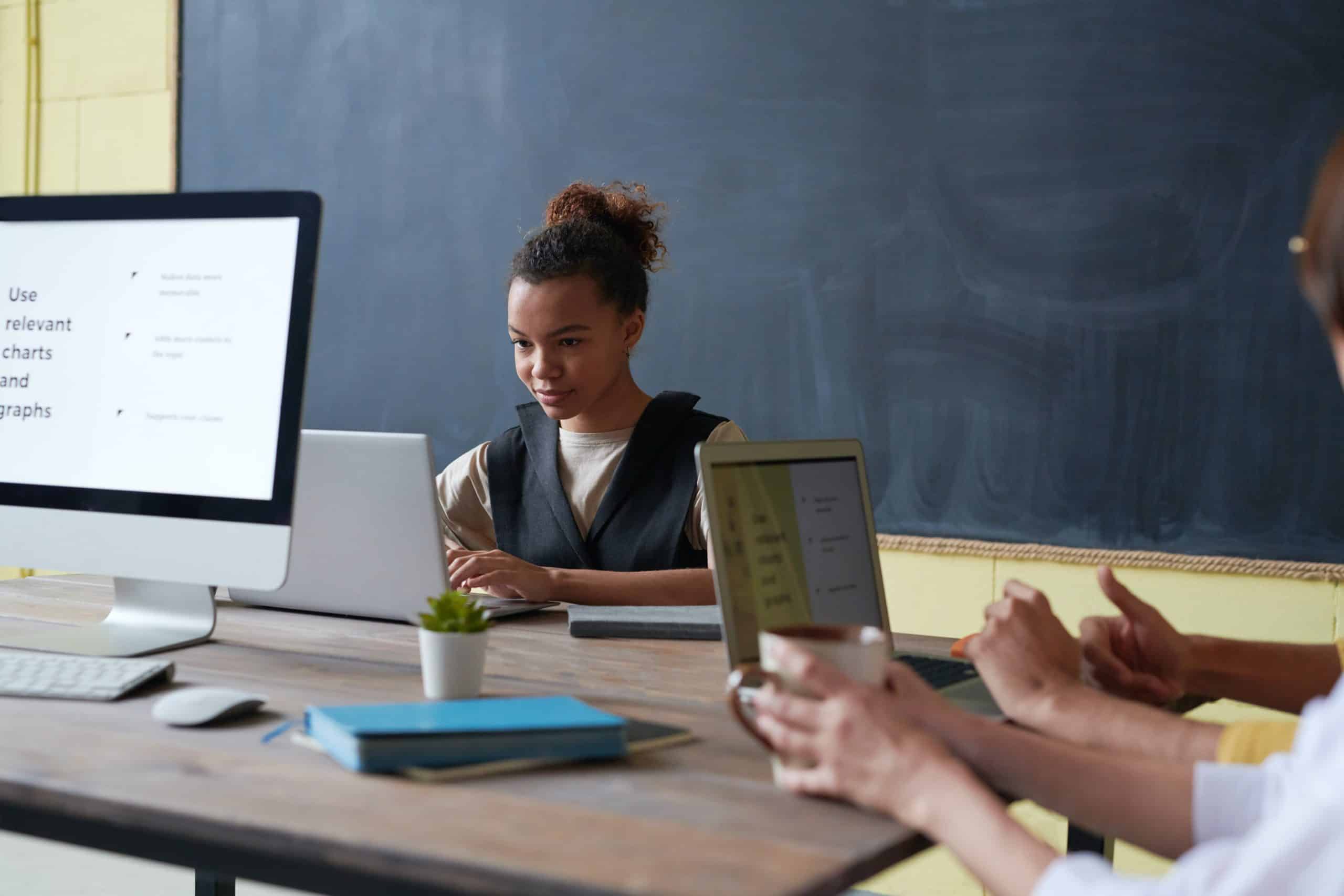 women looking at laptop